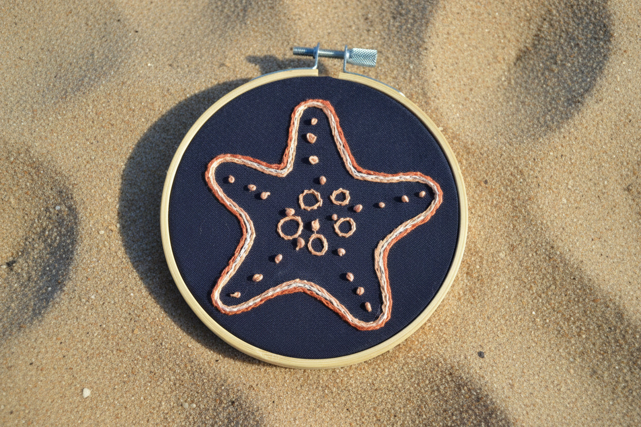 orange starfish embroidery art