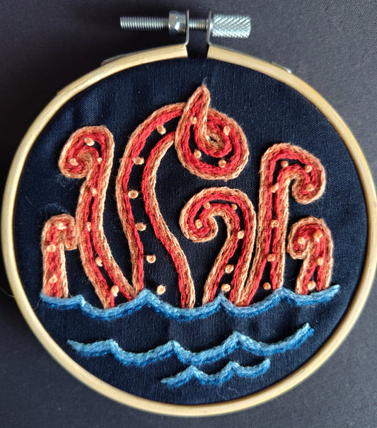 octopus embroidery art hoop in orange